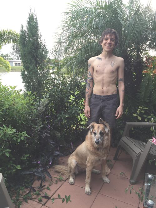 Here's Thom with his dog, Sachi